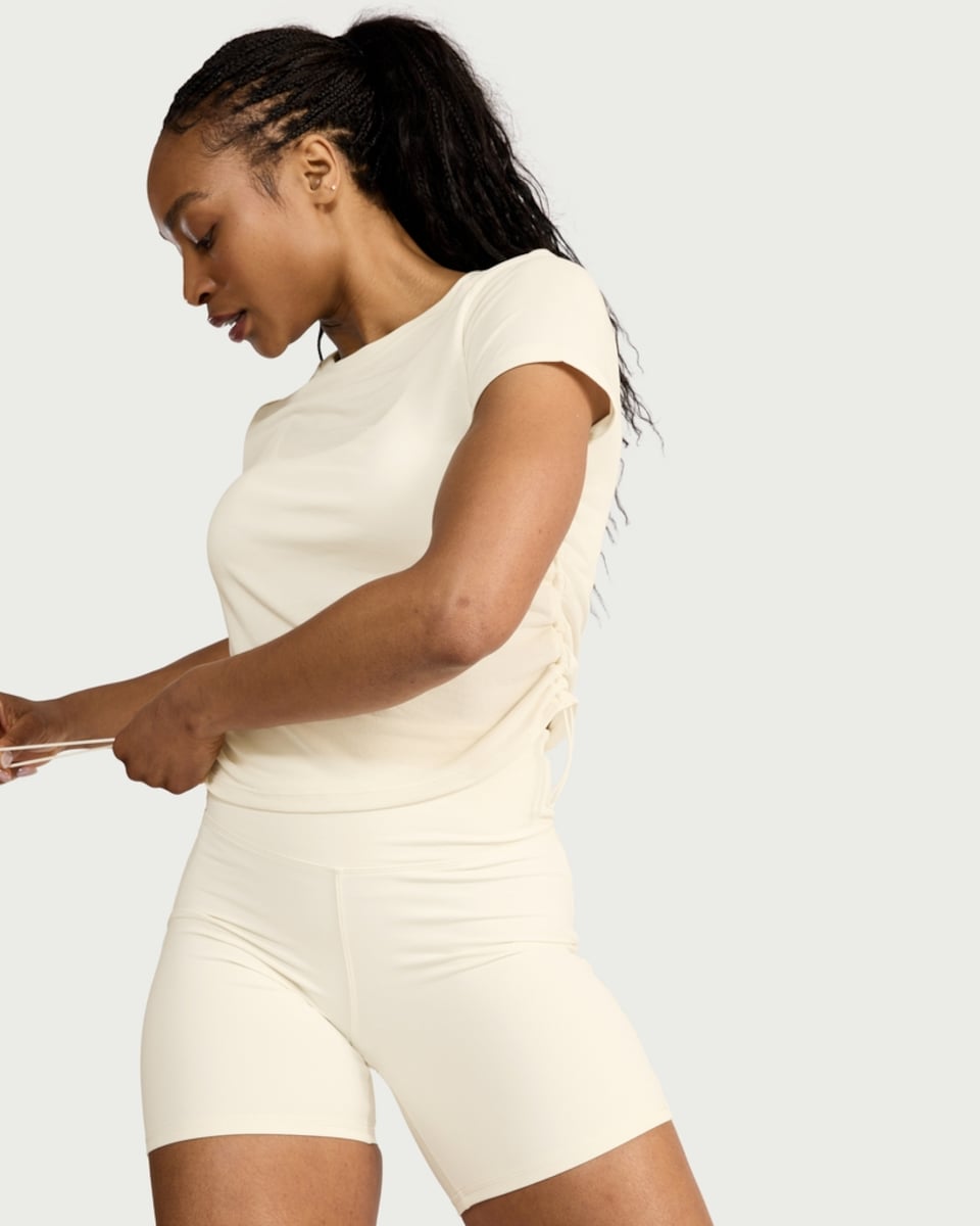 image 1 of F&F Active EVERYHOUR Ruched Side T-Shirt in Cream