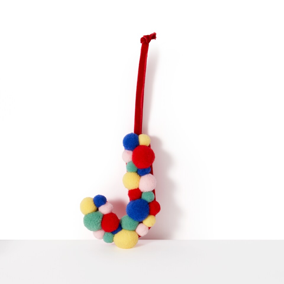 image 1 of Paperchase Cosmic Christmas Pom Pom Letter J Hanging Decoration