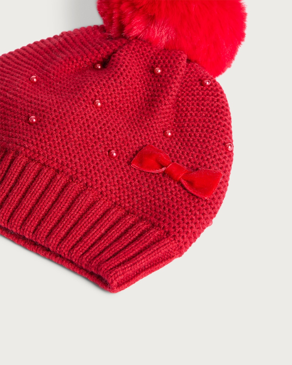 image 1 of F&F Girls Knitted Bow Faux Pearl Pom Pom Beanie Hat in Red