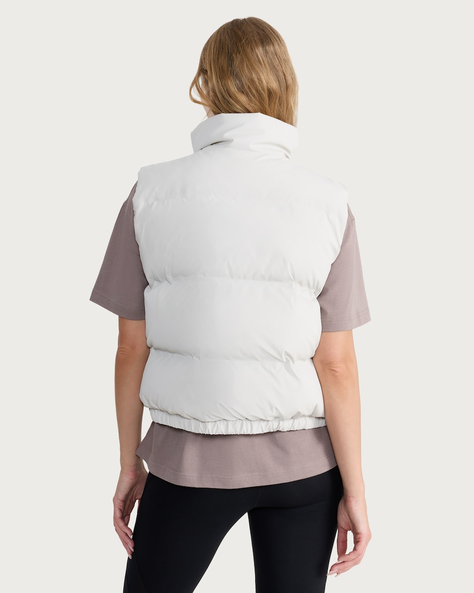 image 1 of F&F Active OUTDOOR Shower Resistant Padded Zip Through Gilet in Cream