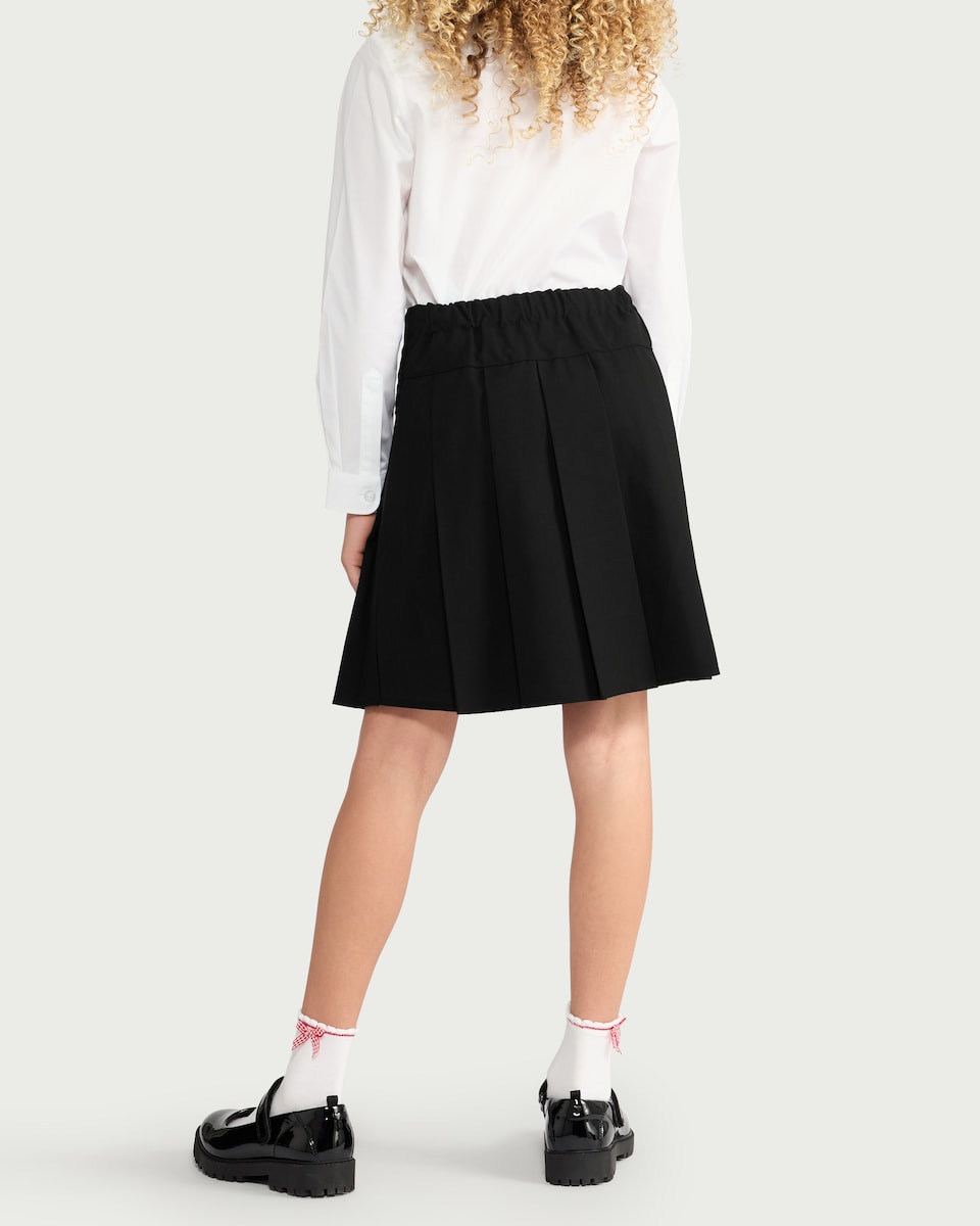 image 1 of F&F Girls School Buckle Pleated Skirt in Black