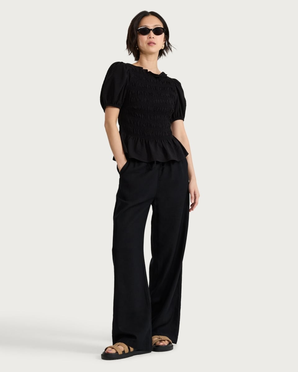 image 1 of F&F Shirred Peplum Puff Sleeved Blouse in Black