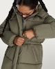 image 1 of F&F Girls Hooded Longline Shower Resistant Puffer Coat in Khaki