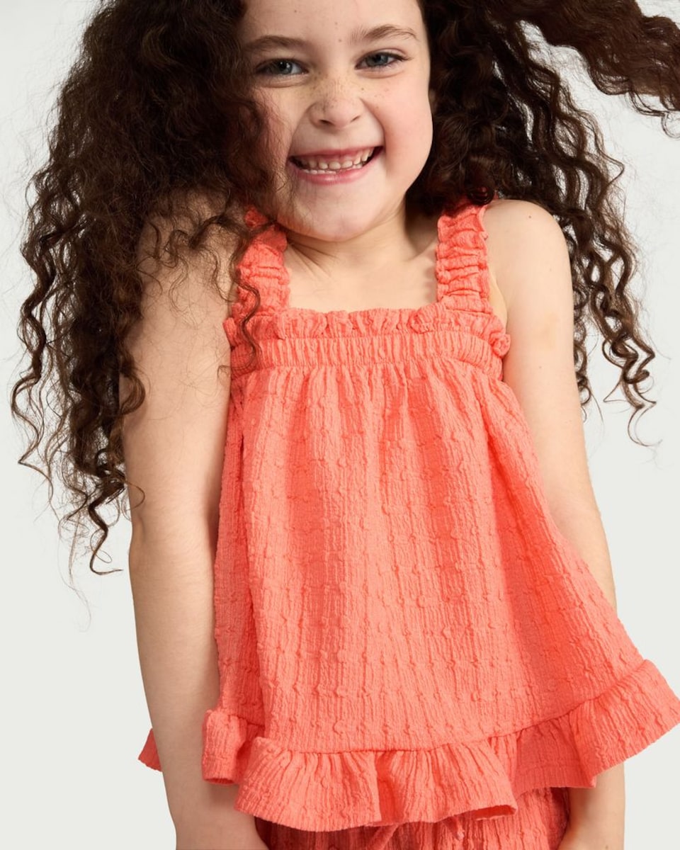 image 1 of F&F Girls 2-Piece Textured Frill Trim Top and Trousers Set in Coral