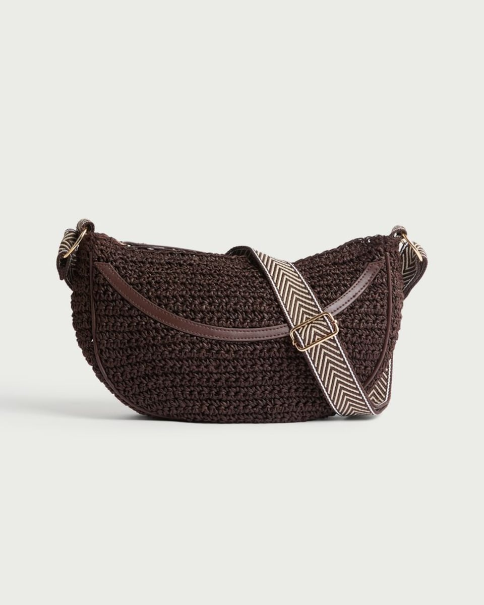image 1 of SACHA Woven Straw Crossbody Bag in Brown
