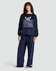 image 1 of Disney Stitch Just Chill Slogan Fleece Pyjamas in Blue