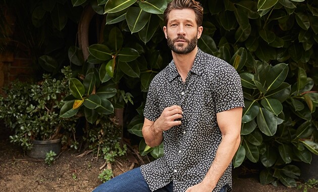 Black short sleeve shirt with small white leaf pattern