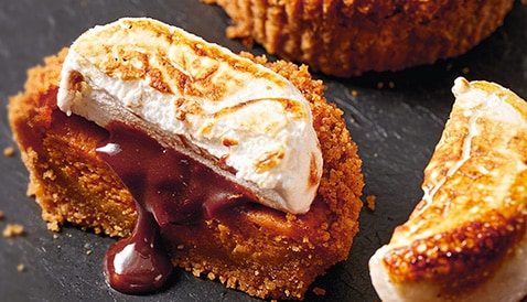  Try this decadent cheesecake with a pumpkin spice base and s'mores topping