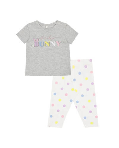 Grey short sleeve PJ top with 'baby bunny' written across the chest in various pastel colours. Paired with pink PJ bottoms with baby pink polka dot pattern. 