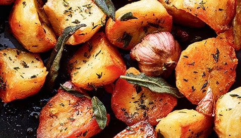 Herby triple cooked roasties