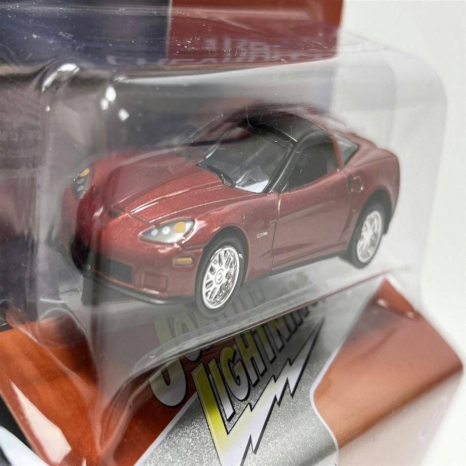 image 1 of 2012 Chevy Corvette Z06 with Tin Inferno Orange 1:64 Scale Johnny Lightning JLCT009B