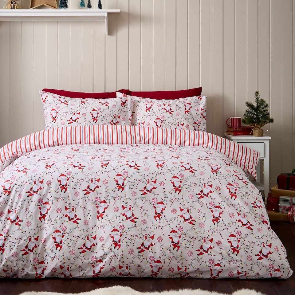 image 1 of Catherine Lansfield Christmas Santas Reversible Duvet Cover Set