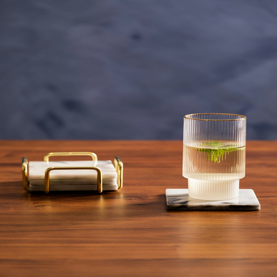 image 1 of Interiors By Premier Set Of Four White Marble Coasters With Brass Finish Holder, Durable Natural Stone Coasters