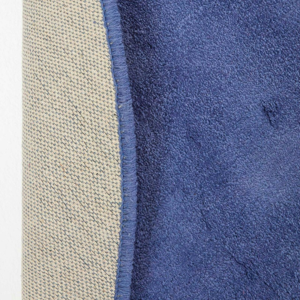 image 1 of Homescapes Hand Tufted Plain Cotton Blue Large Round Rug - 70 cm Diameter Blue | 70 cm Round