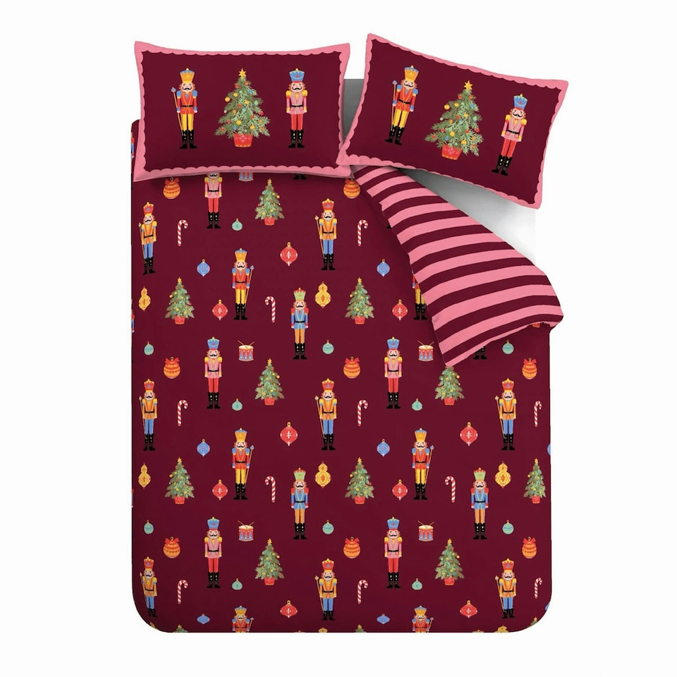 image 1 of Catherine Lansfield Christmas Nutcracker Stripe Reversible Duvet Cover Set Plum | Purple | Plum | Single