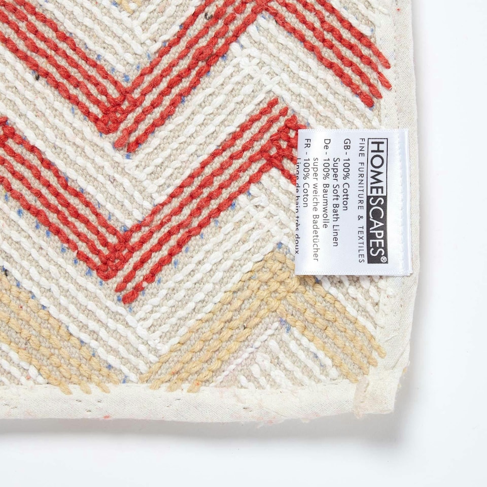 image 1 of Homescapes Orange and Mustard Chevron Cotton Bath Mat | Orange | 50 x 80 cm