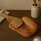 image 1 of Interiors By Premier Olive Wood Serving Board, Wooden Serving Board with Ergonomic Handle, Natural Olive Wood Grain Board Cream