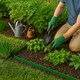 image 6 of Harbour Housewares Flexible Plastic Lawn & Path Edging with 200 Pegs & Mallet - 50m x 4cm - Green | Green | Green | 5
