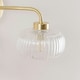 image 3 of ValueLights Amaia Pair of Brushed Gold IP44 Rated 2 Way Clear Ribbed Glass Wall Lights