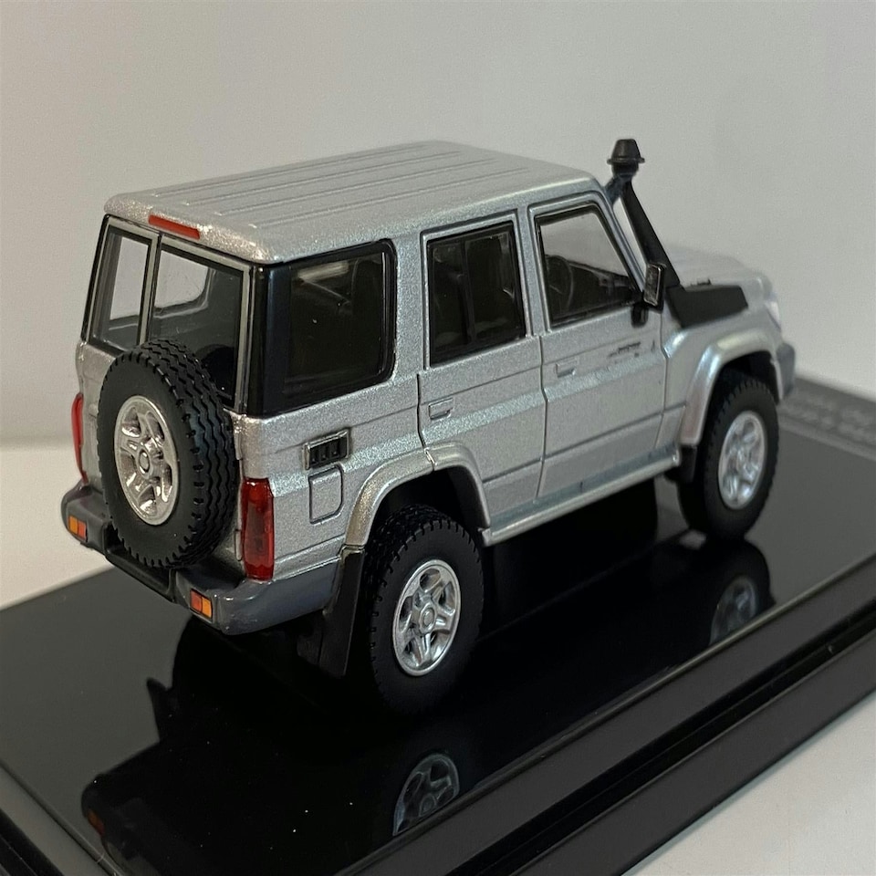 image 1 of Toyota Land Cruiser 76 Silver Pearl 1:64 Scale Paragon 65312R