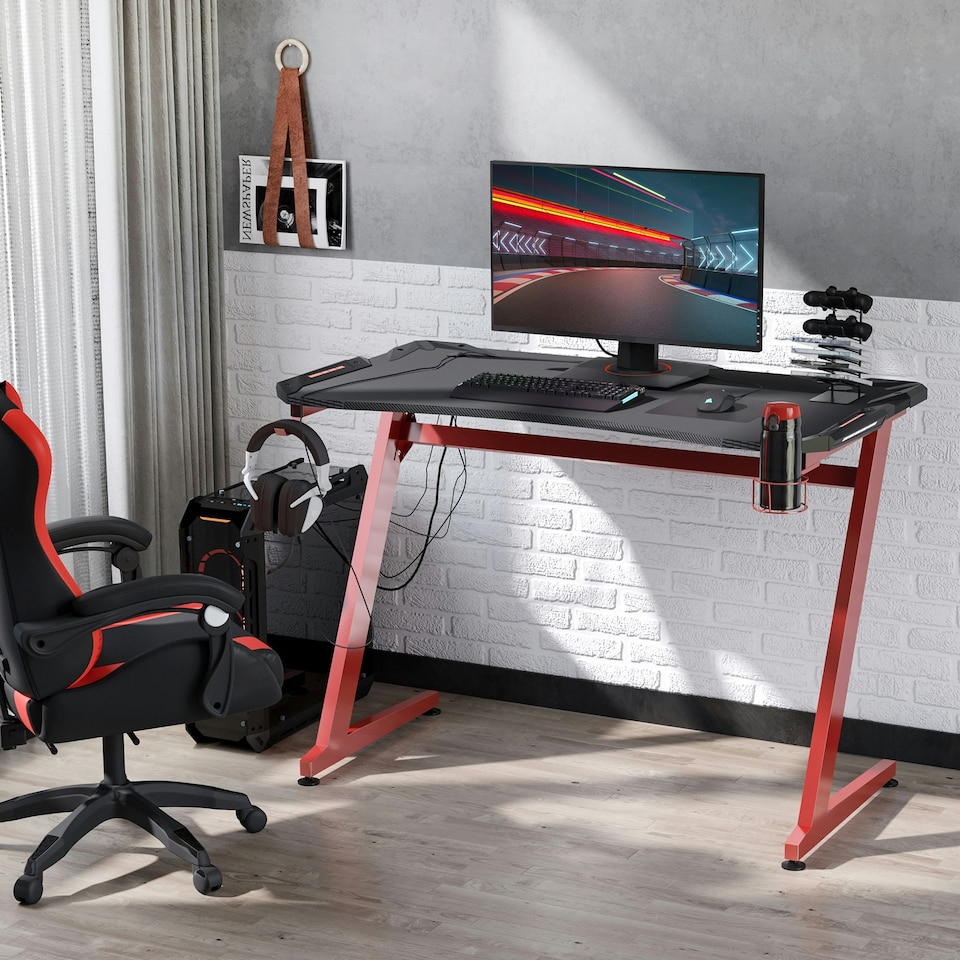 image 1 of HOMCOM 142 x 66 cm Gaming Desk, Carbon Fibre Covered Computer Desk, Gamer Workstation with Headphone Hook, Cup Holder and Gamepad Storage Rack, Black and Red