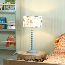 ValueLights Bobbles Powder Blue Bobbin Table Lamp with Cartoon Dino Shade