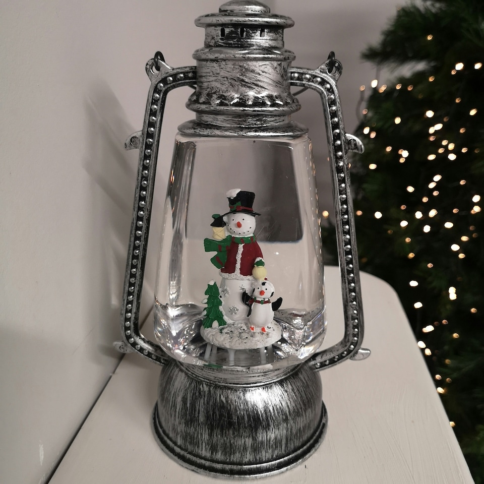 image 1 of 24cm Christmas Water Spinner Antique Silver Effect Hurricane Lantern Style with Snowman & Penguin Scene