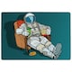 image 1 of Astronaut the audience with beer and popcorn sitting in a chair. loneliness in space. Pop art retro (Rug) Cream | S