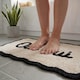 image 4 of Oui Oui Slogan Scalloped Bath Mat