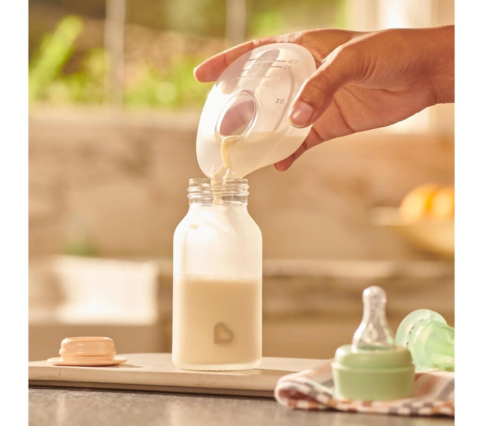 image 1 of Breast Milk Collector Silicone Nursing Pump Baby Feeding Munchkin Easy Use Ergon
