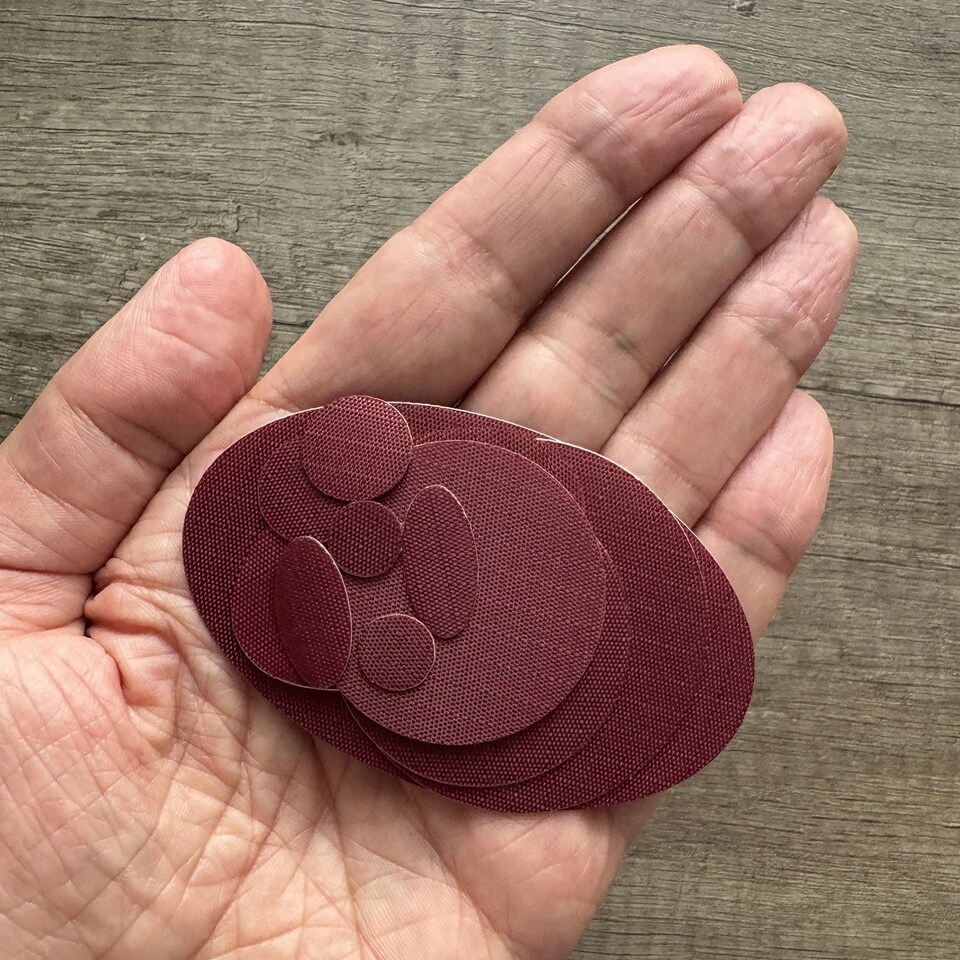 image 1 of aZengear Repair Patches for Jackets, Tent, Shoe, Gear - Waterproof, Self-Adhesive, Tear-Cold-Heat-Resistant (11 Pieces, Burgundy)