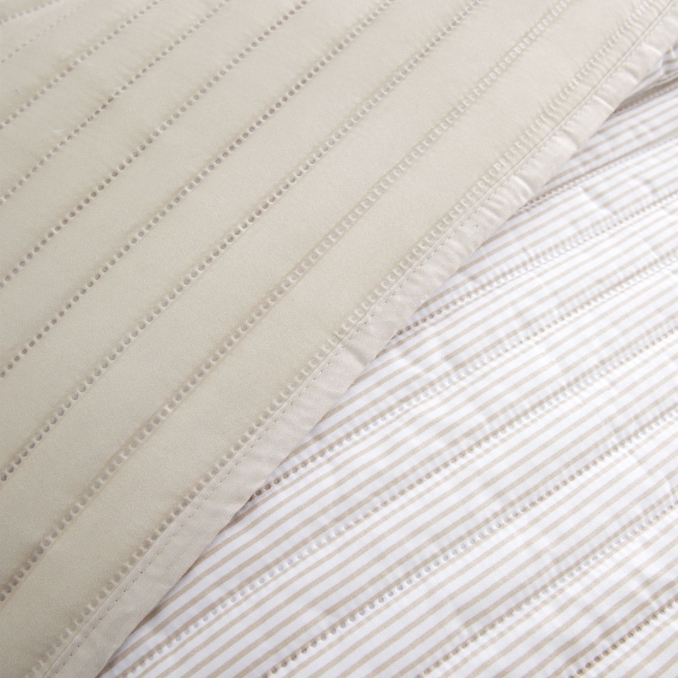 image 1 of Catherine Lansfield Stripe Quilted Reversible Bedspread | Cream | Natural | One Size
