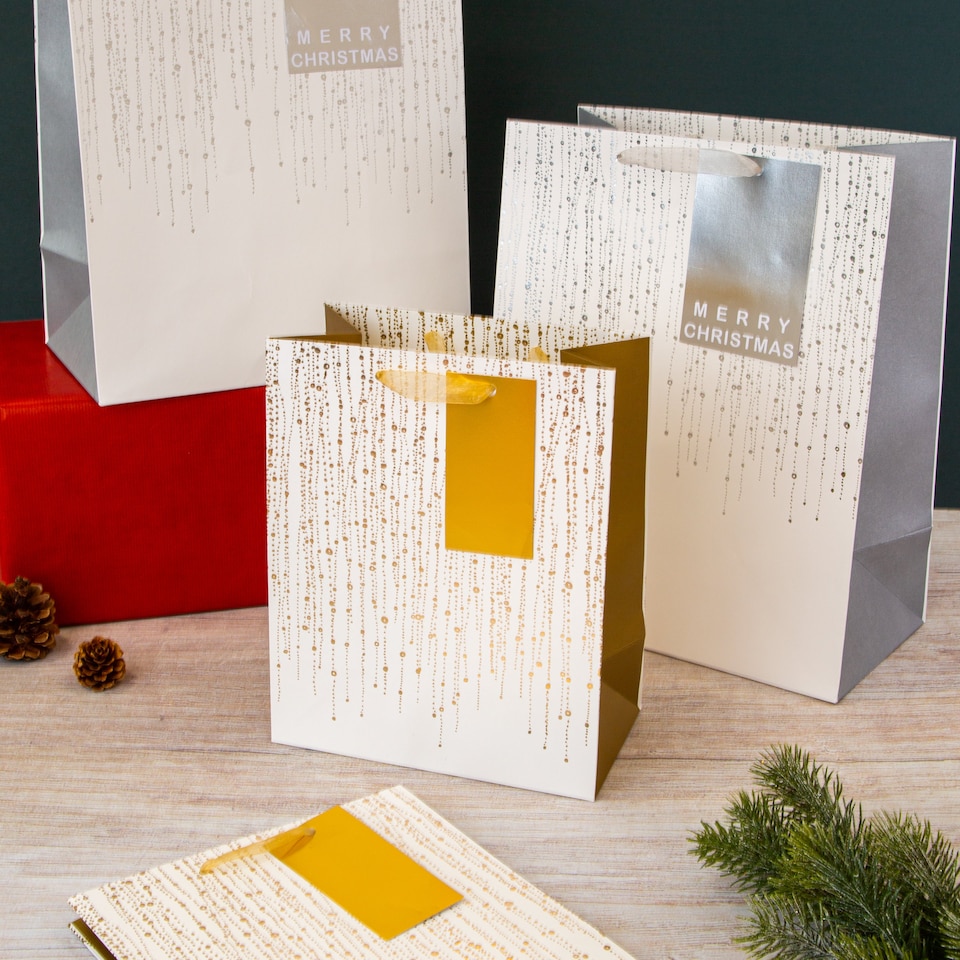image 1 of Hallmark Pack Of 4 Christmas Gift Bags - 2 Sizes 2 Silver and Gold Designs