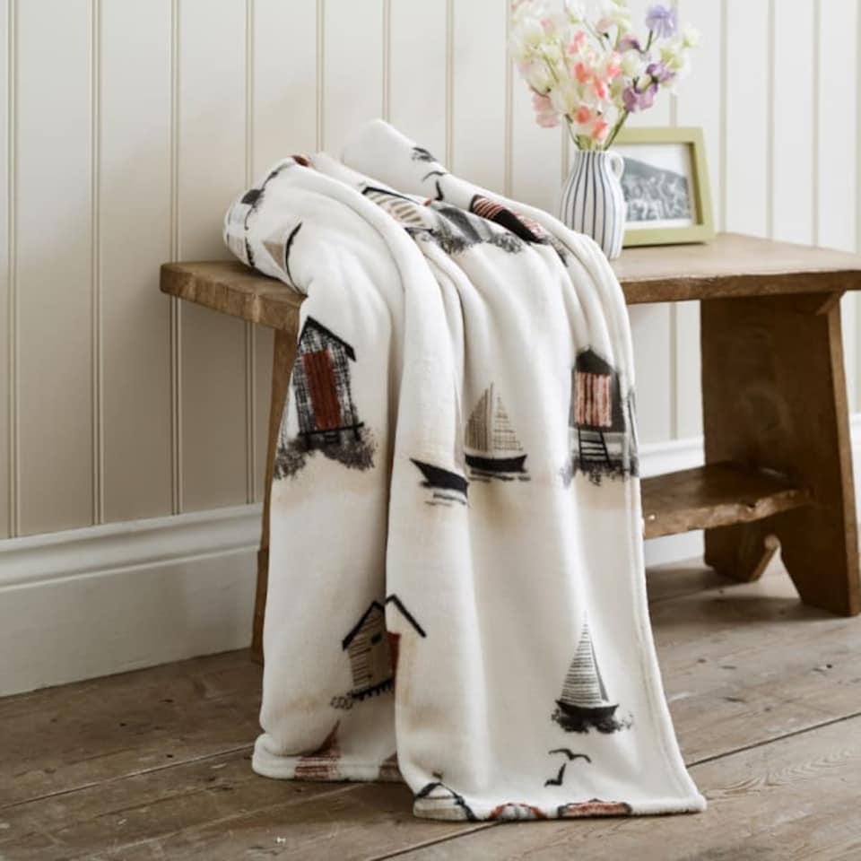 image 1 of Sheringham Soft Coral Fleece Printed Throw