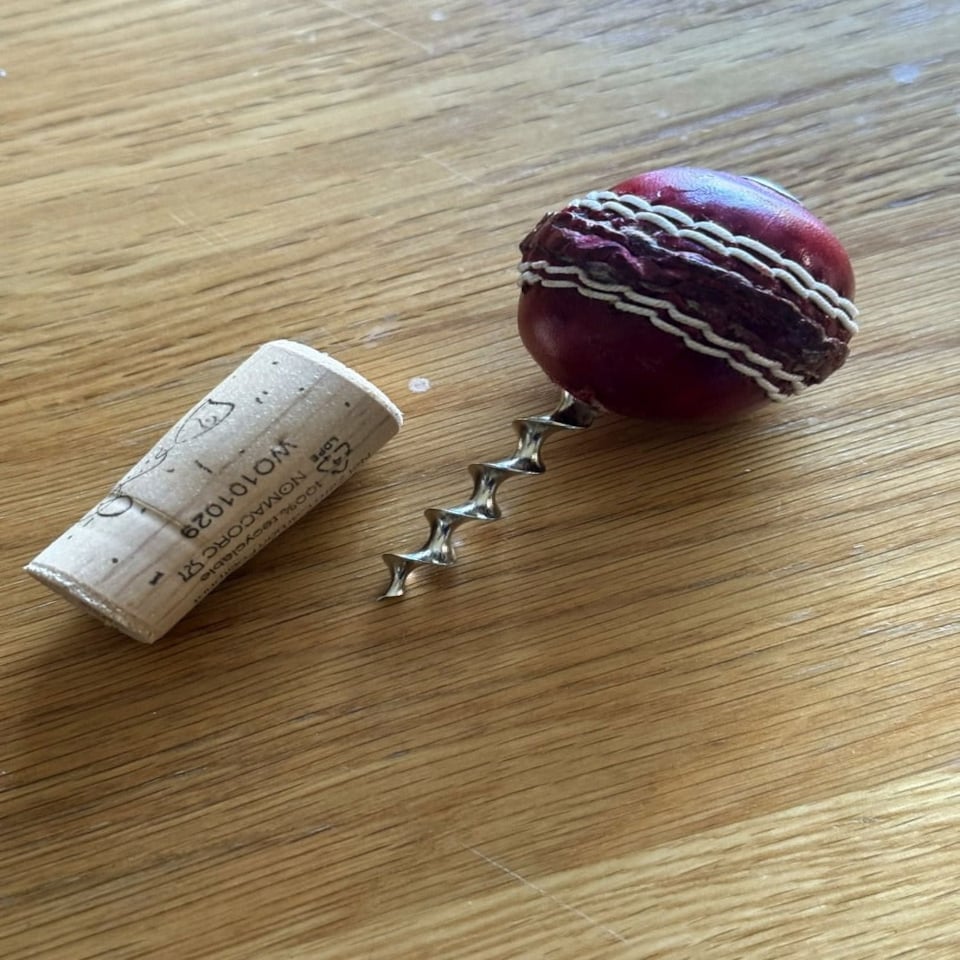 image 1 of CRICKET-GIFTS - Mini Cricket Ball Wine Opener | Hand Made in UK | 4cm Ball & Metal Auger | Easy Wine Cork Removal | Not for Synthetic Corks