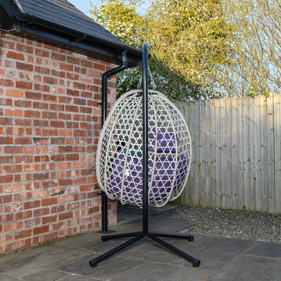 image 1 of Samuel Alexander Hanging Garden Rattan Egg Chair with Steel Frame and Waterproof Cover in Indigo | Purple | Indigo