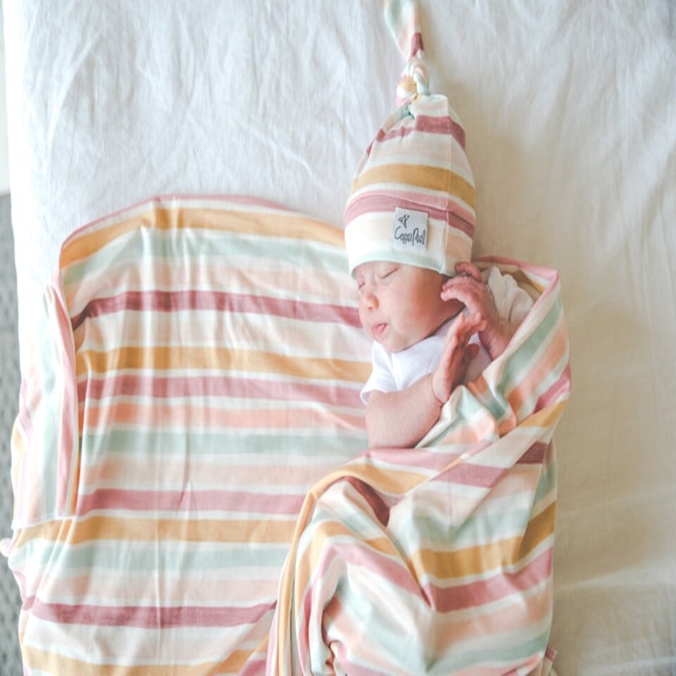 image 1 of Copper Pearl Knitted Swaddle Blanket Enchanted