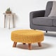 image 2 of Homescapes Mustard Large Round Cotton Knitted Footstool on Legs | Yellow | 62 x 62 x 30 cm