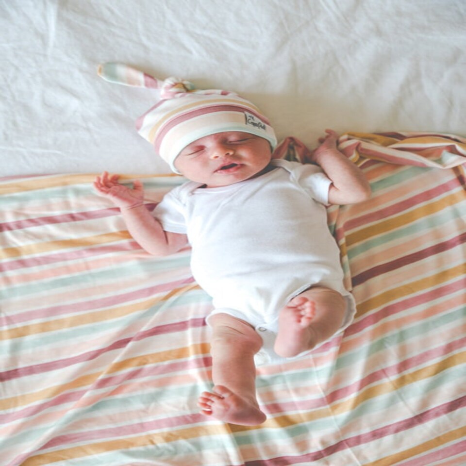 image 1 of Copper Pearl Knitted Swaddle Blanket Enchanted