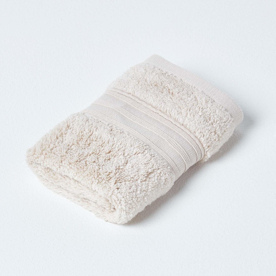 image 1 of Homescapes Zero Twist Supima Cotton Face Cloth - Set of 4, Beige