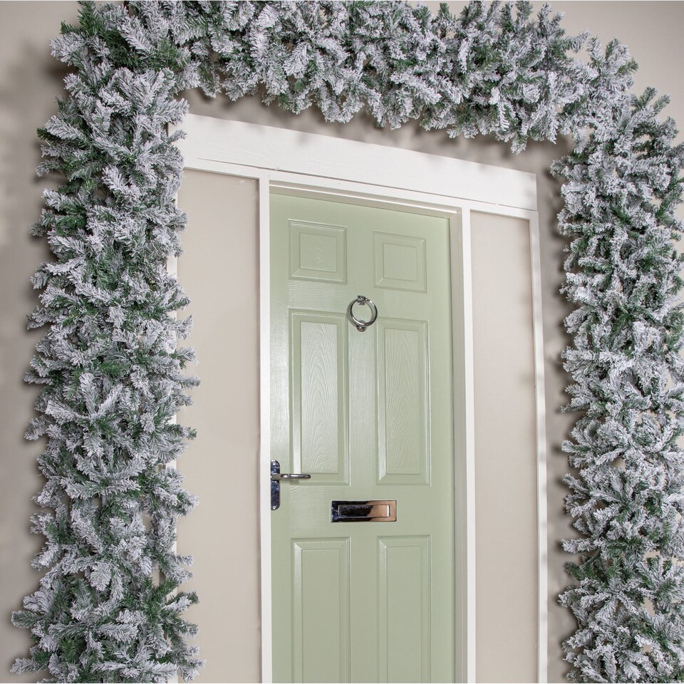 image 1 of 8ft (2.55m) Double Door Artificial Snow Flocked Christmas Tree Arch in Green with 2000 Tips