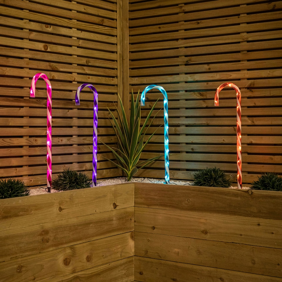 image 1 of 62cm Set of 4 Light up Christmas Candy Cane Garden Path Lights with 40 Rainbow LEDs