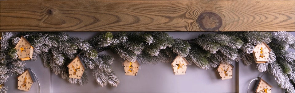 image 1 of St Helens 10 WOODEN FESTIVE HANGING HOUSES WITH LED LIGHTS