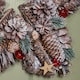 image 7 of 35cm Frosted Hanging Christmas Star Wreath with Red Jingle Bells & Wooden Stars