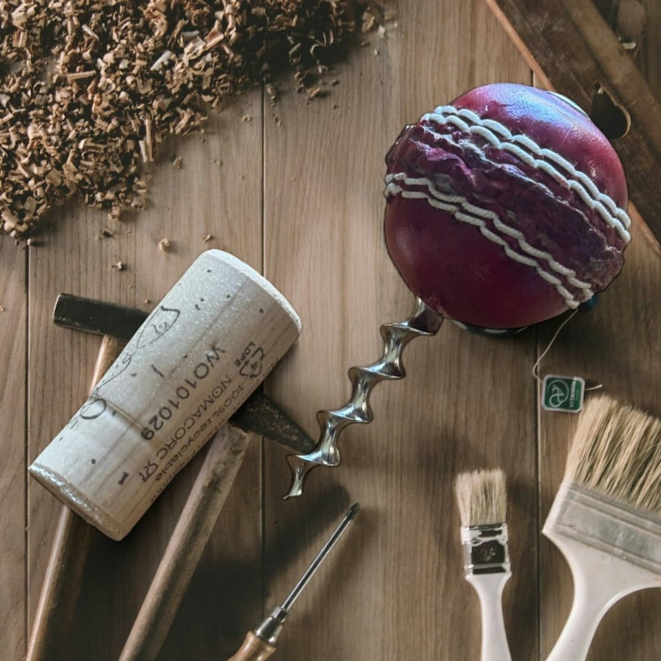 image 1 of CRICKET-GIFTS - Mini Cricket Ball Wine Opener | Hand Made in UK | 4cm Ball & Metal Auger | Easy Wine Cork Removal | Not for Synthetic Corks