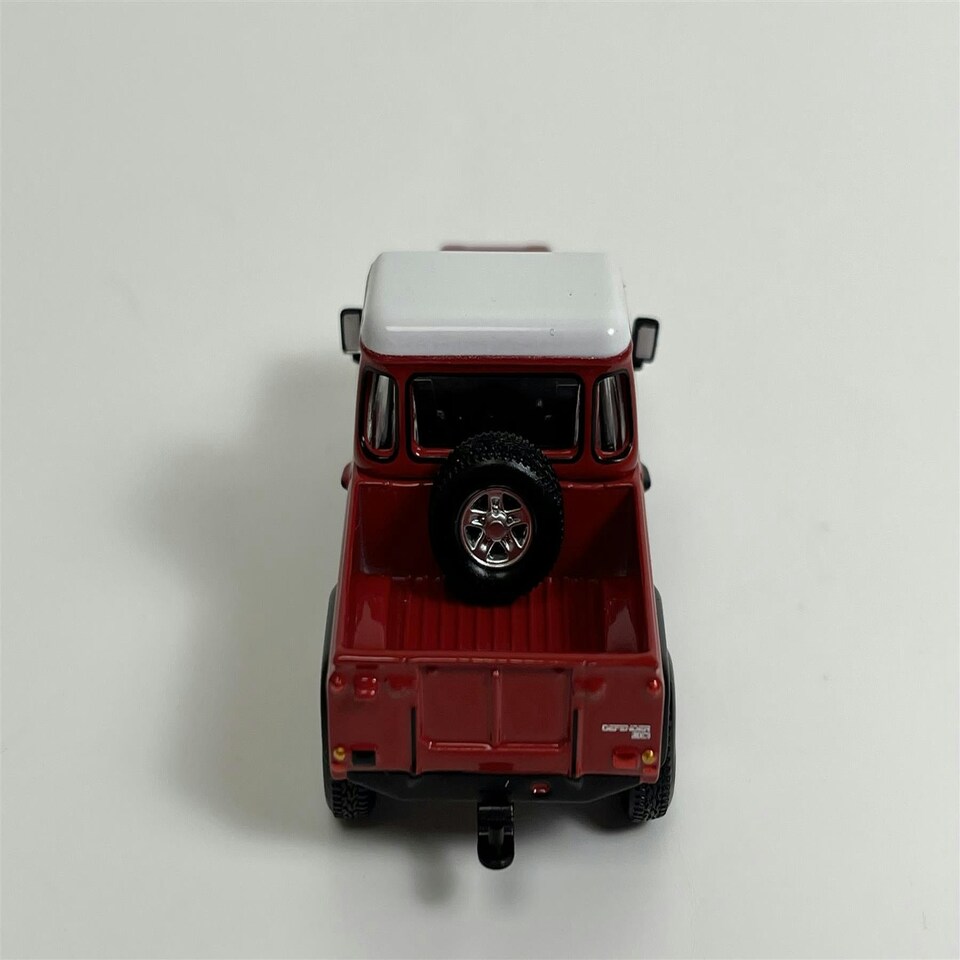 image 1 of Land Rover Defender 90 Pickup Masai Red LHD 1:64 Scale Mini GT MGT00323L