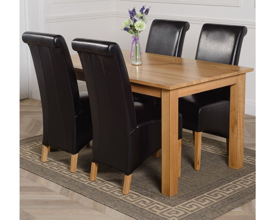 image 1 of Oslo 150 x 90 cm Medium Oak Dining Table and 4 Montana Leather Chairs | Black | Black