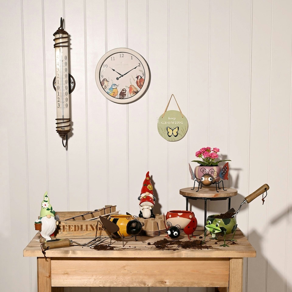 image 1 of Country Living Flower Gonk with Pot Figurine