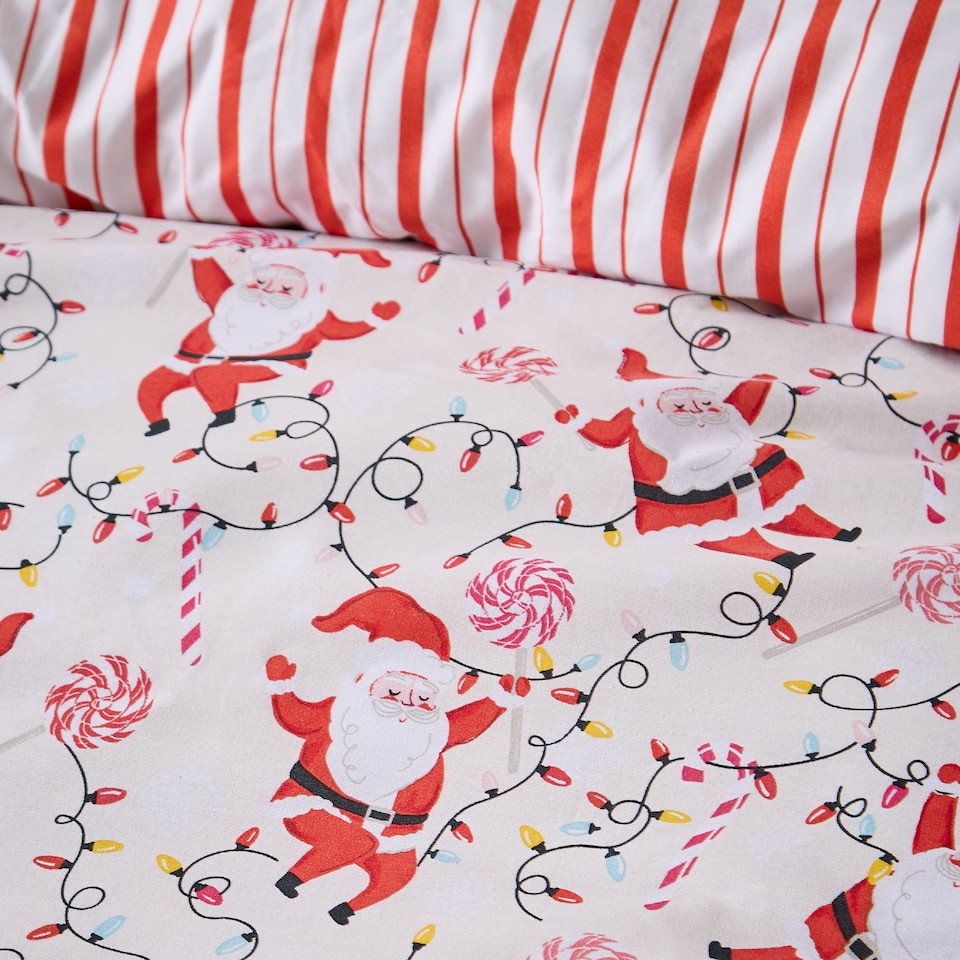 image 1 of Catherine Lansfield Christmas Santas Reversible Duvet Cover Set