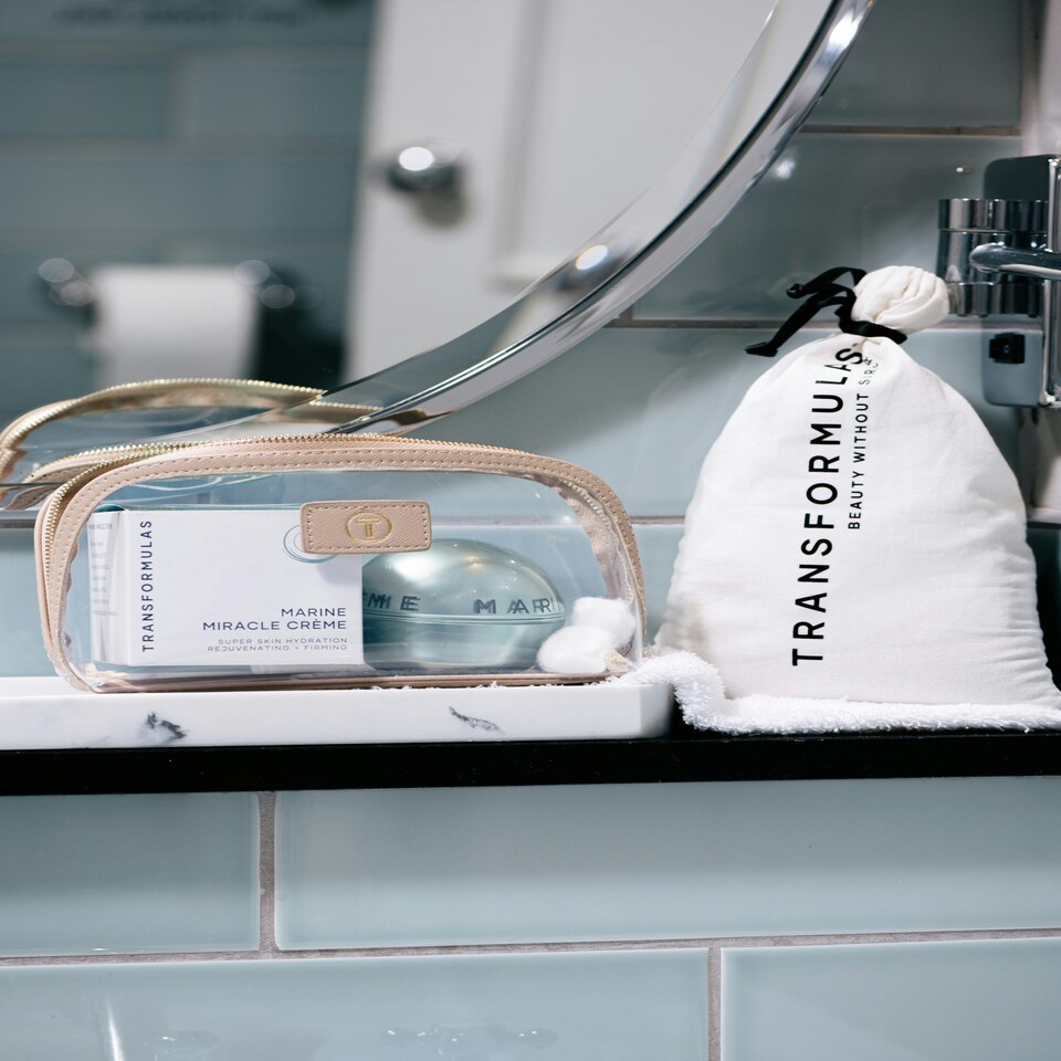 image 1 of Transformulas Clear Cosmeti Case - Nude & Dust Bag | Grey
